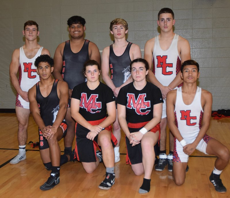 RICK PECK/SPECIAL TO MCDONALD COUNTY PRESS Senior members of the 2019-2020 McDonald County High School wrestling team. Front row, left to right: Junior Teriek, Kaylee Eberley, Jackie Grider and Eh Doh Say. Back row: Jack Teague, McCoy Ikosia, Oscar Ortiz and William Mitchell.