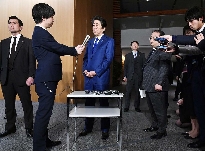 Japan’s Prime Minister Shinzo Abe in Tokyo speaks to the media Thursday about the projectile that North Korea launched earlier in the day. 