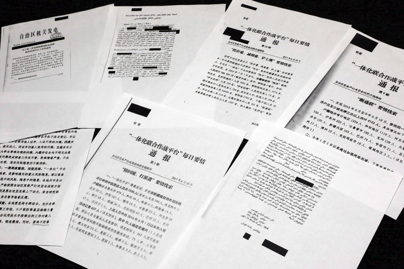 A sample of classified Chinese government documents leaked to a consortium of news organizations, is displayed for a picture in New York, Friday, Nov. 22, 2019. Beijing has detained more than a million Uighurs, ethnic Kazakhs and other Muslim minorities for what it calls voluntary job training. The confidential documents lay out the Chinese government's deliberate strategy to lock up ethnic minorities to rewire their thoughts and even the language they speak. (AP Photo/Richard Drew)
