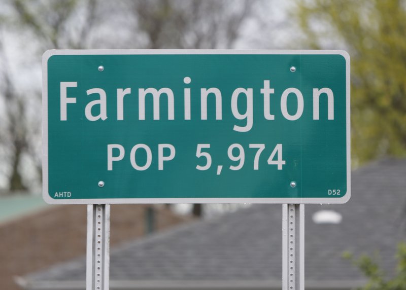 NWA DEMOCRAT-GAZETTE/DAVID GOTTSCHALK A sign for the city of Farmington is seen in this 2016 file photo.