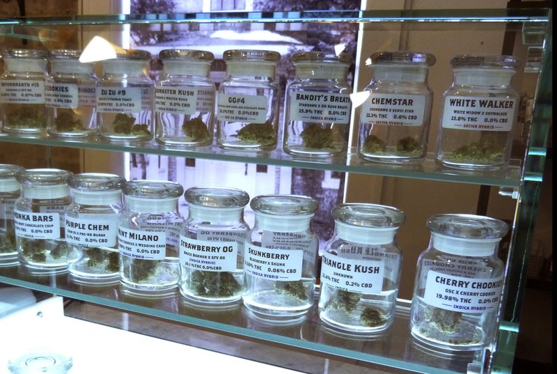 This Nov. 25, 2019 photo shows marijuana on display at Arbors Wellness in the medical marijuana shop in Ann Arbor, Mich. Adults age 21 and over will be able to buy marijuana for recreational use starting Sunday, Dec. 1 in Michigan. (AP Photo/David Eggert)