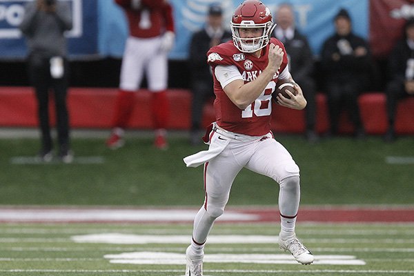 Arkansas quarterback Jack Lindsey (18) runs the ball during the second quarter of the Razorbacks' 24-14 loss to Missouri on Friday, Nov. 29, 2019, at War Memorial Stadium in Little Rock.