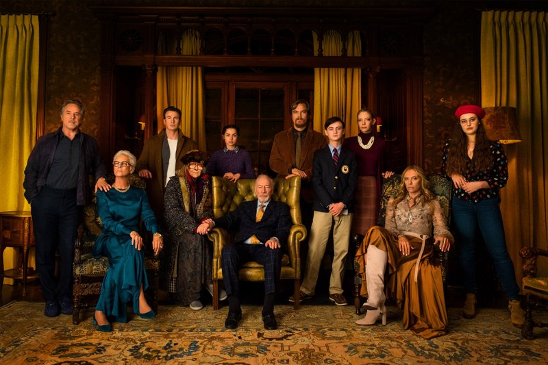 The “all-star” cast of Rian Johnson’s throwback murder mystery Knives Out consists of, from left to right, Don Johnson as Richard, Jamie Lee Curtis as Linda Drysdale, Chris Evans as Ransom Drysdale, K Callan as Greatnana, Ana de Armas as Marta, Christopher Plummer as Harlan, Michael Shannon as Walt, Jaeden Martell as Jacob, Riki Lindhome as Donna, Toni Collete as Joni and Katherine Langford as Meg. 
