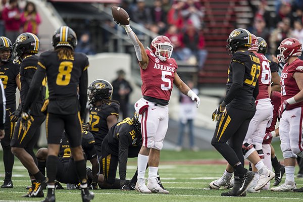 Arkansas running back Rakeem Boyd motions for a first down during a game against Missouri on Friday, Nov. 29, 2019, in Little Rock.