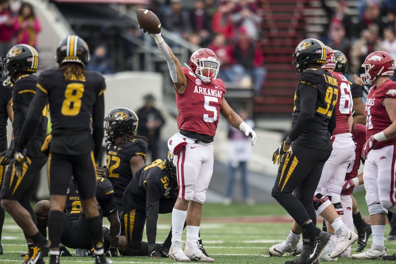 University of Arkansas running back Rakeem Boyd (5) celebrates a first down during the Battle Line Rivalry game against the University of Missouri Tigers at War Memorial Stadium in Little Rock on Friday November 29th 2019.