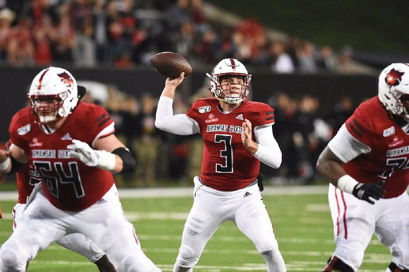 Layne Hatcher, seen here in a game earlier this season, completed 23 of 38 passes for 342 yards and 2 touchdowns in Arkansas State’s 34-30 loss to South Alabama on Friday in Mobile, Ala. 