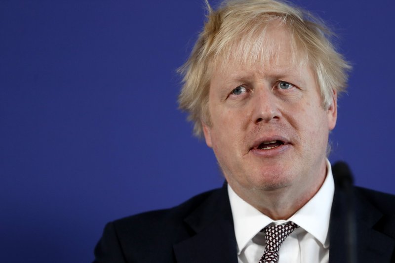 Britain's Prime Minister Boris Johnson speaks during a media conference in London, Friday, Nov. 29, 2019. Britain goes to the polls on Dec. 12. (AP Photo/Frank Augstein)