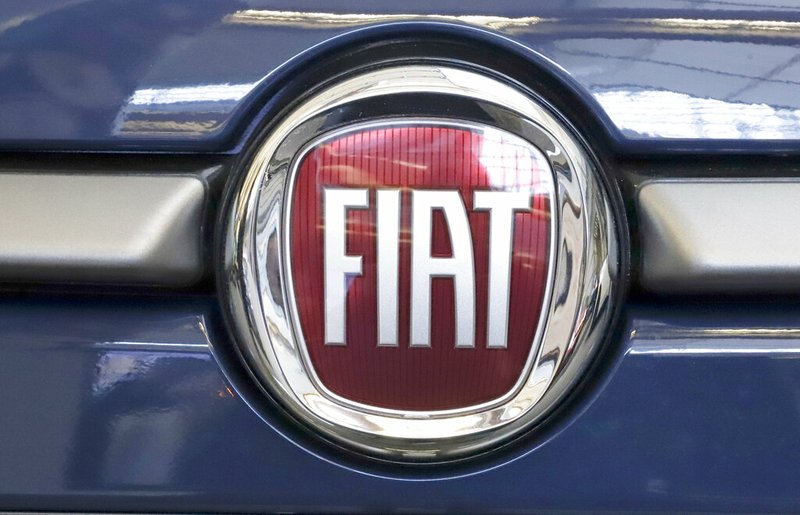 FILE - In this Feb. 14, 2019, file photo, the Fiat logo is mounted on a 2019 500 L on display at the 2019 Pittsburgh International Auto Show in Pittsburgh.
