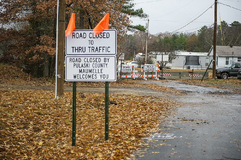 This sign notifies drivers that the southern end of Short Marche Road in Maumelle is closed but not at the direction of city officials, Mayor Caleb Norris said.