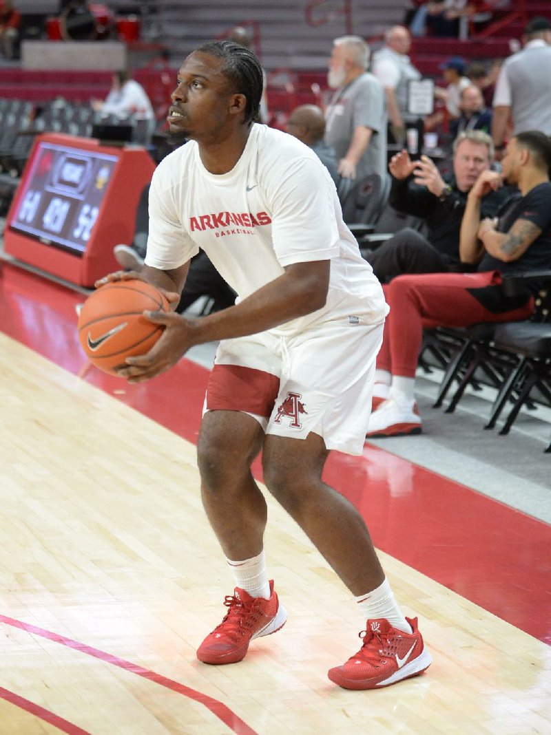 Arkansas' Jamario Bell warms up Saturday, Nov. 30, before the Razorbacks' game with Northern Kentucky in Bud Walton Arena at Fayetteville.