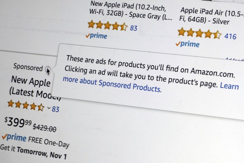This photo Thursday, Oct. 31, 2019, shows the sponsored logo, and explanation, in an Amazon product offering on a computer screen in New York. Amazon has turned its online store into an advertising powerhouse in just a few years. (AP Photo/Richard Drew) story.lead_photo.caption