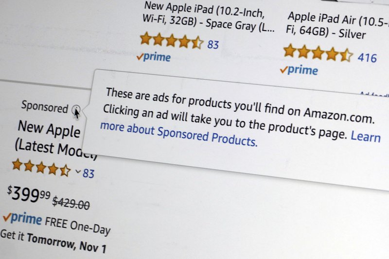 This photo Thursday, Oct. 31, 2019, shows the sponsored logo, and explanation, in an Amazon product offering on a computer screen in New York. Amazon has turned its online store into an advertising powerhouse in just a few years. (AP Photo/Richard Drew)