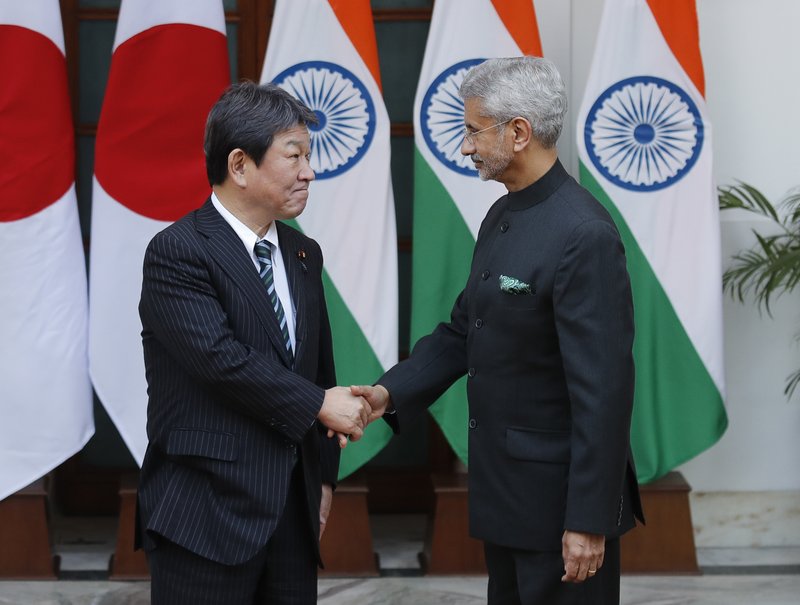 Indian Foreign Minister S. Jaishankar, right, shakes hand with his Japanese counterpart Toshimitsu Motegi before the start of India Japan 2+2 talks in New Delhi, India, Saturday, Nov. 30, 2019, to boost bilateral security and Defense cooperation between the two countries. (AP Photo/Manish Swarup)