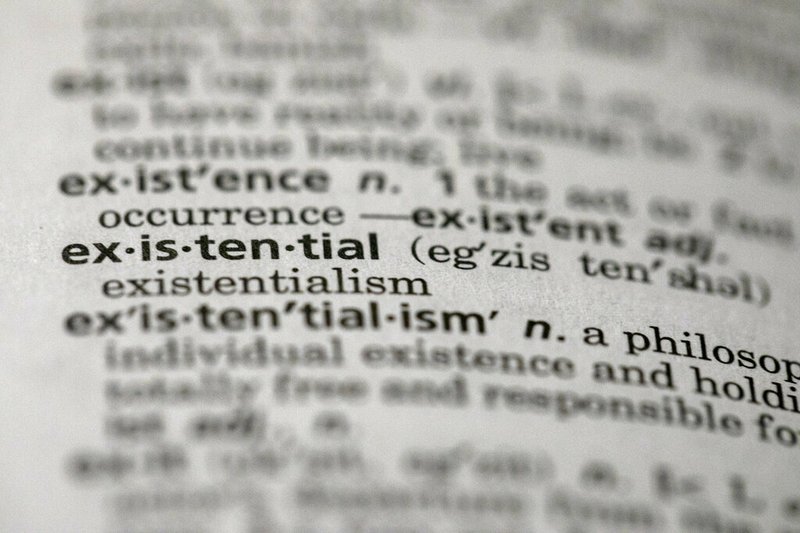 This Sunday, Dec. 1, 2019, photo shows the word "existential" in a dictionary in the Brooklyn borough of New York. Dictionary.com picked "existential" as the word of the year. The choice reflects months of high-stakes threats and crises, real and pondered, across the news, the world and throughout 2019. (AP Photo/Jenny Kane) story.lead_photo.caption