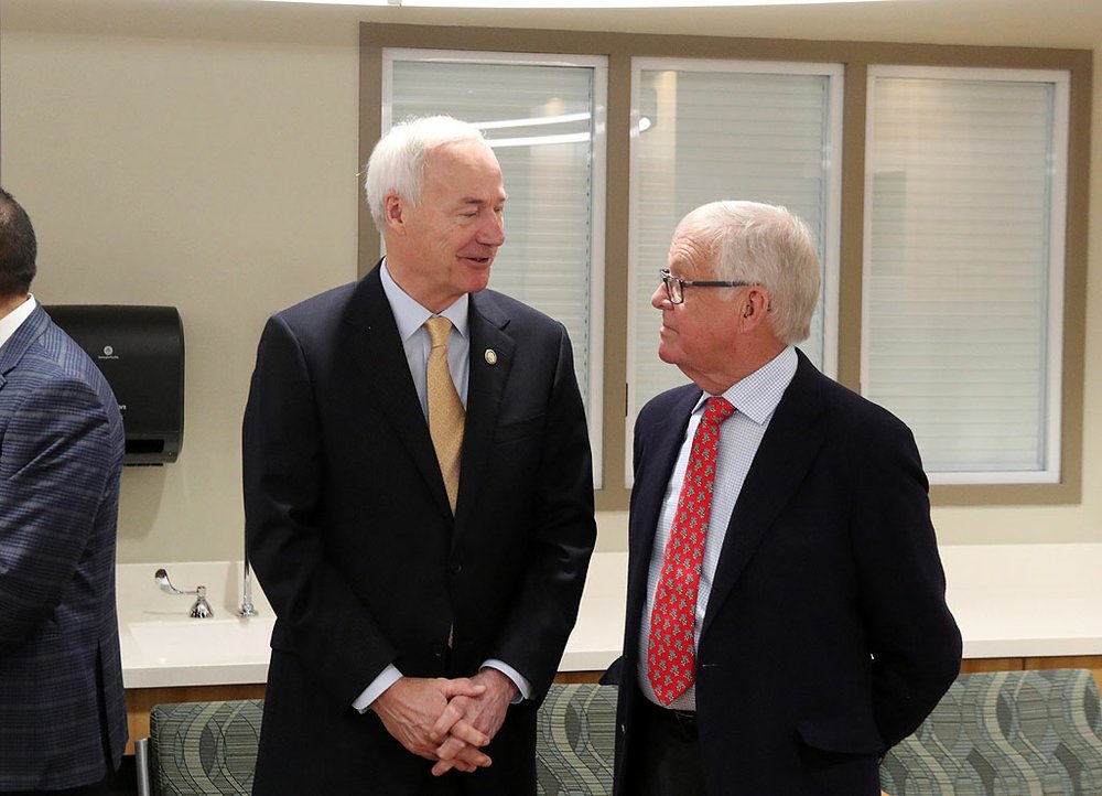 Gov. Asa Hutchinson, left, talks with John Ed Anthony at the grand opening of the new CHI St. Vincent Hot Springs Anthony Childbirth Center on Monday. Anthony attended as a representative of the Catherine Cooper Anthony Charitable Trust. - Photo by Richard Rasmussen of The Sentinel-Record