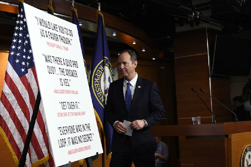 House Intelligence Committee Chairman Adam Schiff leaves a news conference Tuesday on Capitol Hill after releasing his panel’s report and after President Donald Trump called him “deranged” and “sick.” More photos at arkansasonline.com/124impeachment/ 