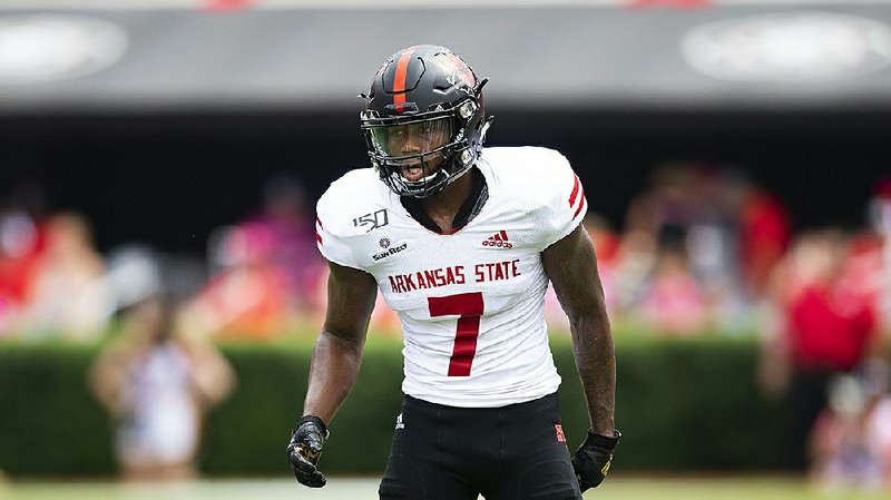 Arkansas State wide receiver Omar Bayless, who leads the nation with a school-record 1,473 receiving yards this season, was named the Sun Belt Conference Player of Year on Wednesday. 