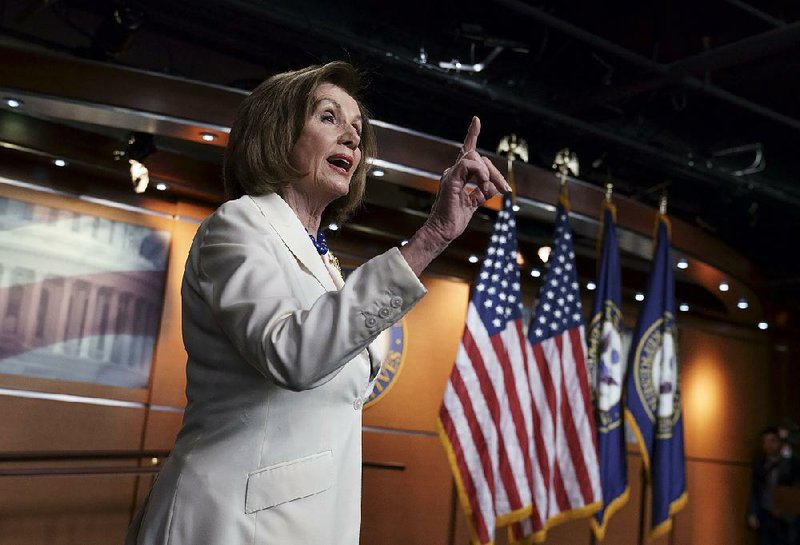 “Don’t mess with me when it comes to words like that,” House Speaker Nancy Pelosi said Thursday when asked if she hates President Donald Trump. The comment followed Pelosi’s announcement that formal articles of impeachment were being drafted. More photos at arkansasonline.com/126impeachment/ 