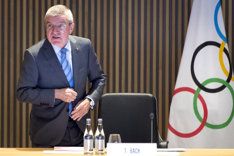 International Olympic Committee (IOC) president Thomas Bach from Germany speaks at the opening of the executive board meeting of the International Olympic Committee (IOC), at the Olympic House, in Lausanne, Switzerland, Tuesday, Dec. 3, 2019. (Laurent Gillieron/Keystone via AP)