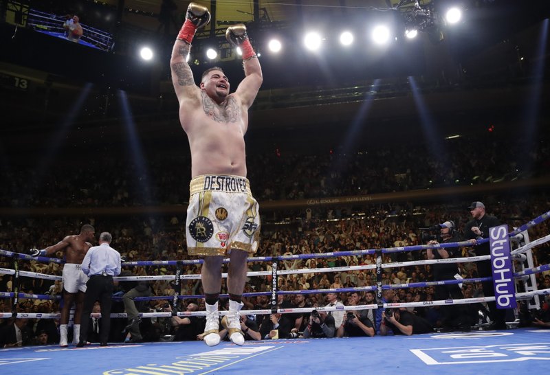 The Associated Press STAYING ON TOP: Mexican American Andy Ruiz celebrates after stopping Britain's Anthony Joshua during the seventh round of a June 1 heavyweight championship boxing match in New York. Heavyweight boxing heads to new territory when Andy Ruiz Jr. and Anthony Joshua meet in a rematch in Saudi Arabia on Saturday. Ruiz will look to mark the first world title fight in the Middle East for retaining the belts he took from Joshua a major shock in New York in June.