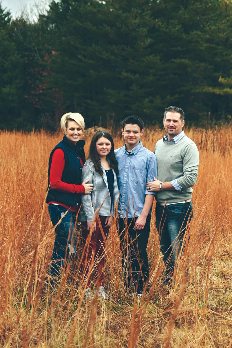 Tiffany and Patrick Turney of Sulphur Rock had family photos made just before Tiffany’s hair fell out from chemotherapy. Here, they are shown with their children, Bella, 10, and Aiden, 12.