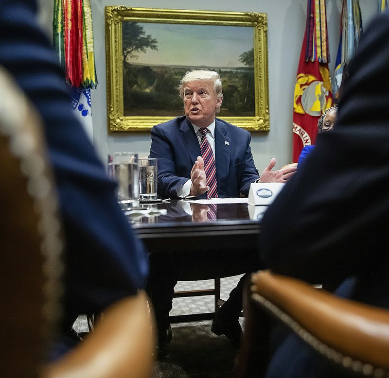 President Donald Trump speaks at a small-business gathering Friday at the White House. In tweets, Trump touted the strong job numbers and said the economy would be even better if not for what he called the Democrats’ “horror show.” More photos at arkansasonline.com/127jobs/ 