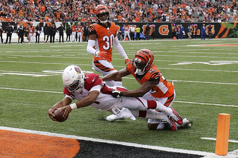 Arizona Cardinals quarterback Kyler Murray (1) leaps in for a touch- down against the Cincinnati Bengals in a 26-23 victory on Oct. 6. Murray, who was the first overall pick in the draft, has thrown for 2,866 yards with 14 touchdowns and 6 interceptions while rushing for 446 yards and 4 touchdowns.