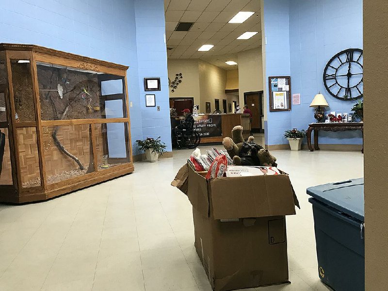 Residents’ puzzles, slippers, stuffed animals and other belongings sat packed and waiting Thursday, Dec. 5, 2019, at the Horseshoe Bend nursing home as staff members scrambled to find new facilities for people forced to leave the abruptly closed facility. 