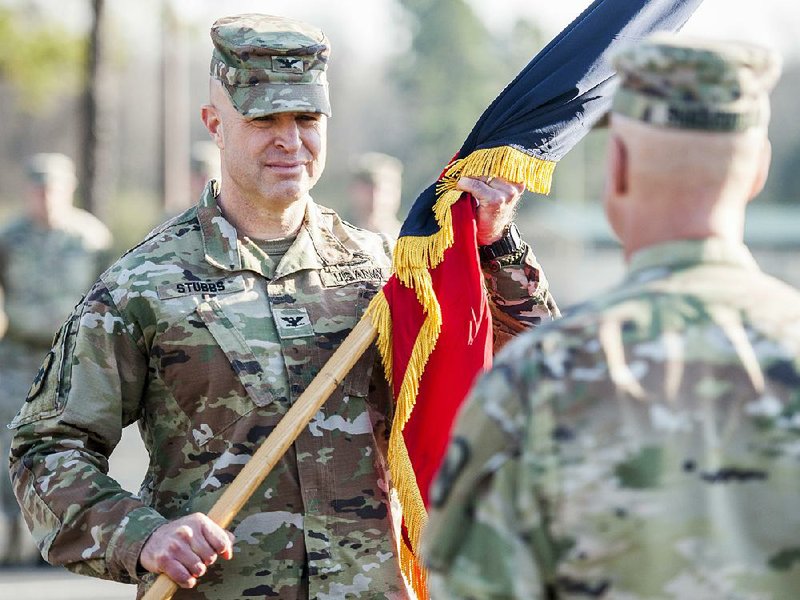 FILE — Then-Col. Jonathan Stubbs (facing camera) takes command of the Arkansas National Guard 39th Infantry Brigade Combat Team from the outgoing commander Col. Cary Shillcutt during a change of command ceremony at the Camp Robinson Maneuver Training Center in North Little Rock in this Dec. 7, 2019 file photo.