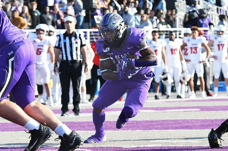 UCA running back Carlos Blackman (right) ran for 35 yards and a touchdown, and he caught 5 passes for 47 yards in the Bears’ 24-14 loss to Illinois State on Saturday in the second round of the FCS playoffs at Estes Stadium in Conway.