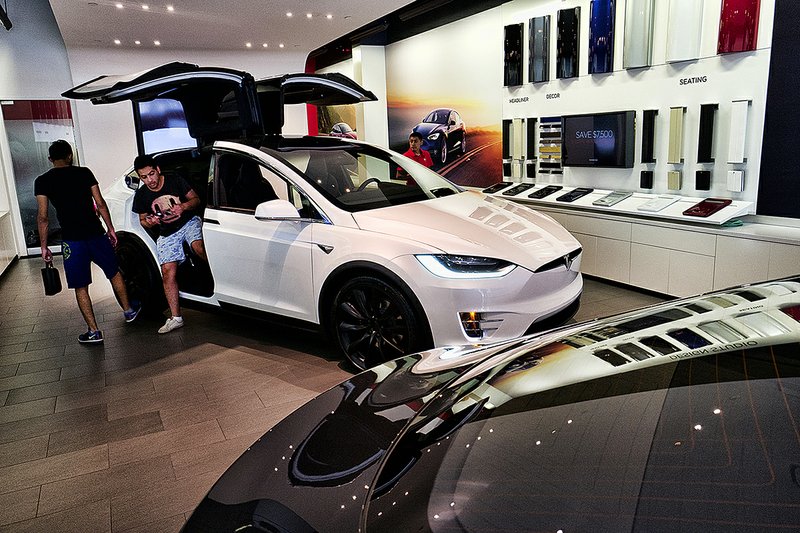 California last week stopped offering rebates for luxury electric cars priced above $60,000, like the Tesla X seen at a Tesla showroom in Santa Monica, Calif., in August 2018. 