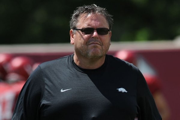 Sam Pittman watches Arkansas football practice on Saturday, Aug. 8, 2015 in Fayetteville.