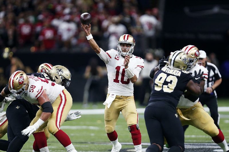 San Francisco’s Jimmy Garoppolo threw for 349 yards and four touchdowns as the 49ers defeated the New Orleans Saints 48-46 on Sunday in New Orleans. 