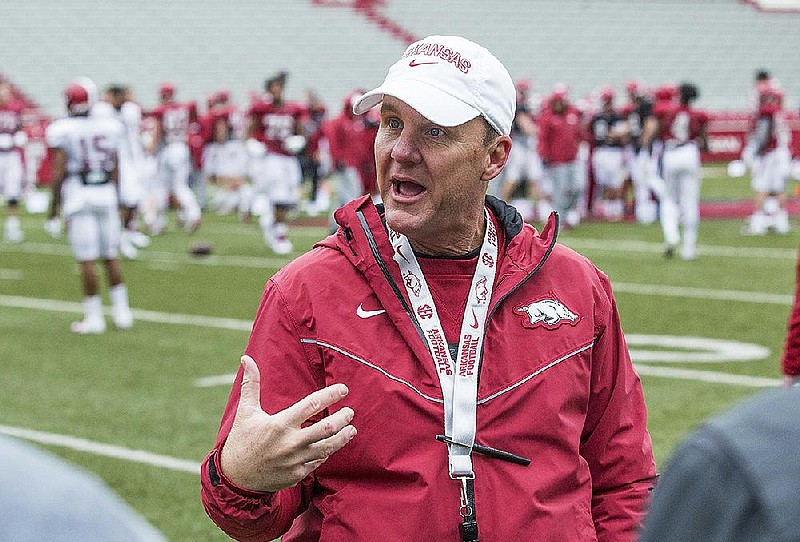 In this 2019 file photo Chad Morris, former Arkansas head coach, greets former Arkansas players during Arkansas spring practice at Reynolds Razorback Stadium in Fayetteville. 
(NWA Democrat-Gazette/BEN GOFF @NWABENGOFF)