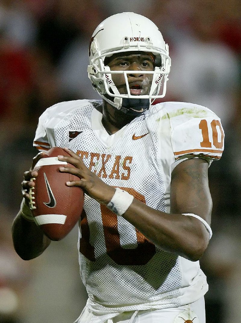 Former Texas quarterback Vince Young came in second in the 2005 Heisman Trophy balloting to Southern Cal running back Reggie Bush, but he used it as motivation to win the 2006 national championship. He was among the 13 players and two coaches inducted into the College Football Hall of Fame on Tuesday.
(AP file photo)