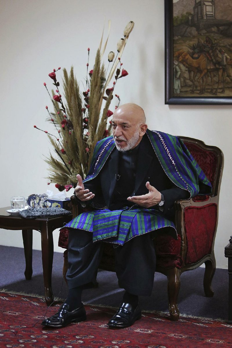 Former Afghan President Hamid Karzai said recently published documents confirm his long-running complaints about U.S. spending in his country.
(AP/Altaf Qadri)