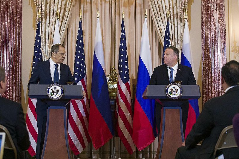 Russian Foreign Minister Sergey Lavrov (left) holds a news conference Tuesday at the State Department with Secretary of State Mike Pompeo. Lavrov later met with President Donald Trump.
(AP/Alex Brandon) 