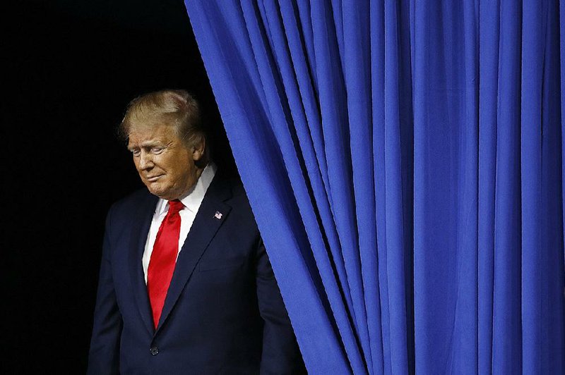 President Donald Trump takes the stage Tuesday evening in Hershey, Pa., for a campaign rally. Trump had harsh words for the FBI and the Justice Department inspector general’s report on the Russia investigation during the rally. His remarks echoed a scathing tweet earlier in the day.
(AP/Patrick Semansky) 