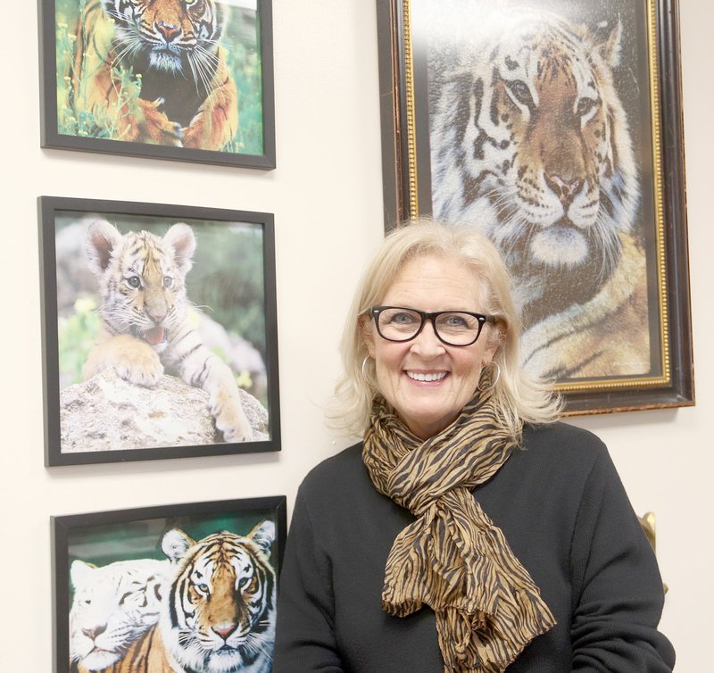 LYNN KUTTER ENTERPRISE-LEADER Becky Ramsey grew up in Prairie Grove and graduated from Prairie Grove High School. Her educational career recently brought her back to Prairie Grove as the new elementary school co-principal. Her office contains Tiger paraphernalia that she has collected over the past 30 years.