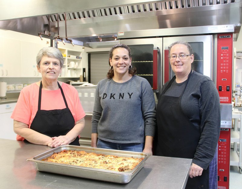 LYNN KUTTER ENTERPRISE-LEADER Dena Swaffar (left) of Farmington, has served as director of food services for Lincoln Senior Center since April. She is assisted by Patsy Edwards and Kim Waskom, both of Lincoln. The food is receiving rave reviews from senior adults at the center. This day, the staff served lasagna, several sides and brownies for dessert. The lunch is available for seniors 60 and over for a suggested $3 donation. It's also open to those under 60 years of age for $6.59 per meal.