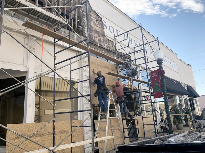 LYNN KUTTER ENTERPRISE-LEADER The building downtown that once housed The Flower Shop is under repair and possibly will have a new business and an apartment in the future. The building is owned by Larry Nelson and Carrie Kass.