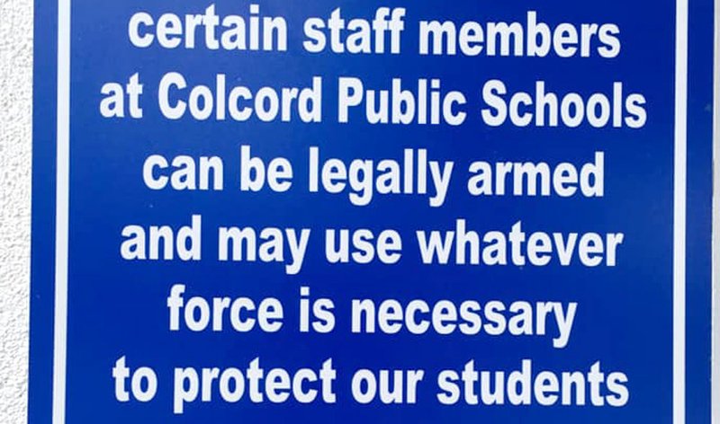 Photo submitted Colcord (Okla.) Schools recently displayed signs stating that certain staff members may be armed and will use whatever force necessary to protect students.