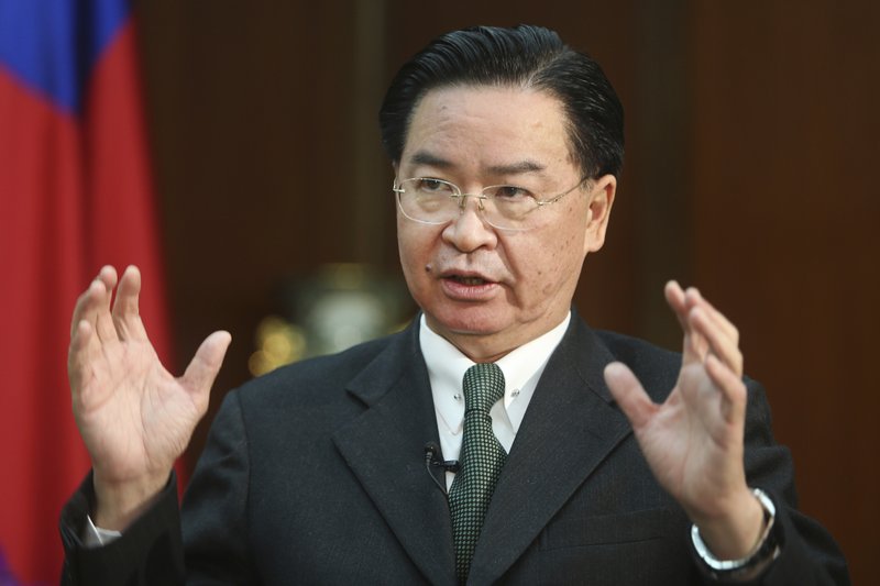 Taiwanese Foreign Minister Joseph Wu speaks during an exclusive interview with The Associated Press at his ministry in Taipei, Taiwan, Tuesday, Dec. 10, 2019. 
 (AP Photo/Chiang Ying-ying)