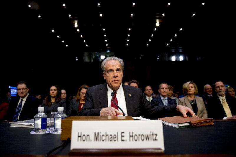 Department of Justice Inspector General Michael Horowitz arrives for a Senate Judiciary Committee hearing on the Inspector General's report on alleged abuses of the Foreign Intelligence Surveillance Act, Wednesday, Dec. 11, 2019, on Capitol Hill in Washington. (AP Photo/Andrew Harnik)