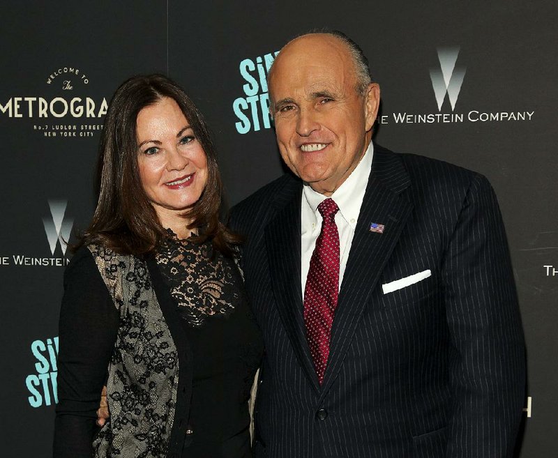 In this Tuesday, April 12, 2016, file photo, Judith Giuliani, left, and former New York mayor Rudy Giuliani, right, attend the premiere of "Sing Street" at Metrograph, in New York. Giuliani and his third wife, Judith, have reached a settlement in a yearslong court battle that exposed details about their luxurious lifestyle, The New York Times reported on Tuesday, Dec. 10, 2019. 
(Invision/AP/Andy Kropa)