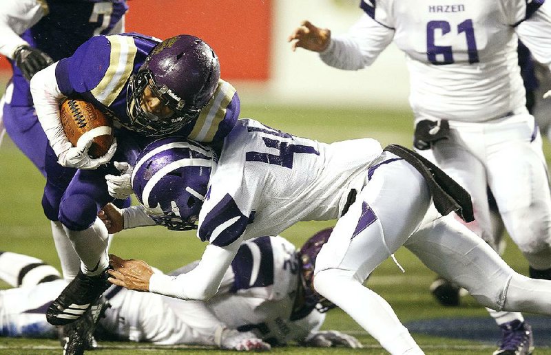 Junction City running back Jakiron Cook, shown against Hazen in last year’s Class 2A championship game, has rushed for 688 yards and 10 touchdowns in three playoff victories for the Dragons this season. The Dragons returned to the 2A final this season and will face Fordyce on Saturday.
(Arkansas Democrat-Gazette/Thomas Metthe)