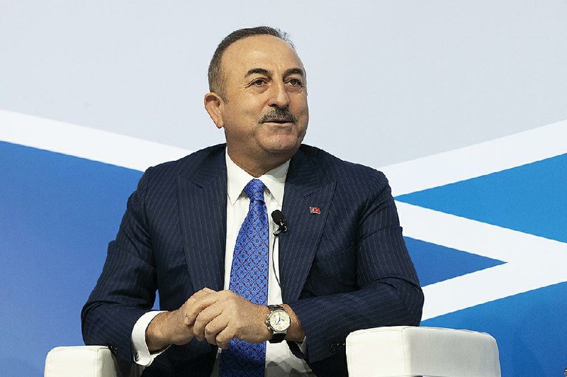 Turkish Minister of Foreign Affairs Mevlut Cavusoglu delivers his speech at the Mediterranean Dialogues conference in Rome, Friday, Dec. 6, 2019. 
(AP Photo/Alessandra Tarantino)