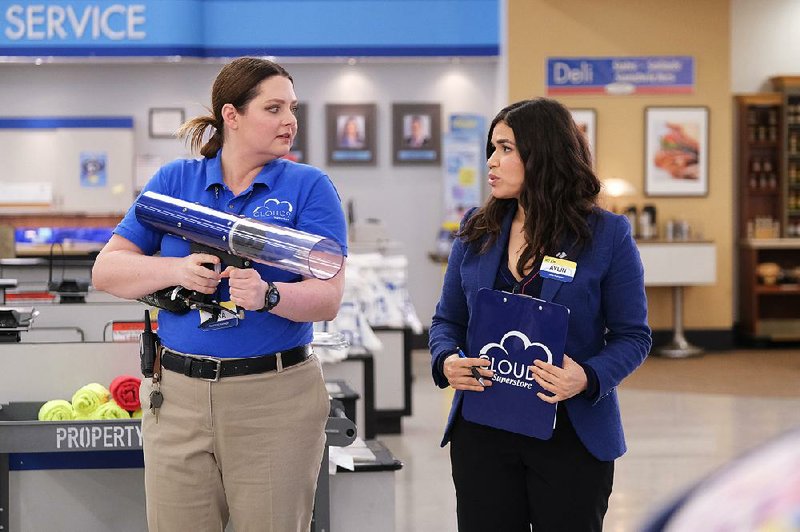 Lauren Ash (left) stars as Dina and America Ferrera plays Amy on NBC’s Superstore. Ash has added podcaster to her resume with Giving It Up For Less, which takes advantage of her impulse to overshare.
(NBC/Tyler Gordon)