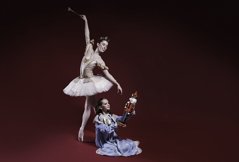 Ballet Arkansas company member Meredith Loy with community cast member Ava Lawson as Clara in The Nutcracker. 
(Special to the Democrat-Gazette)