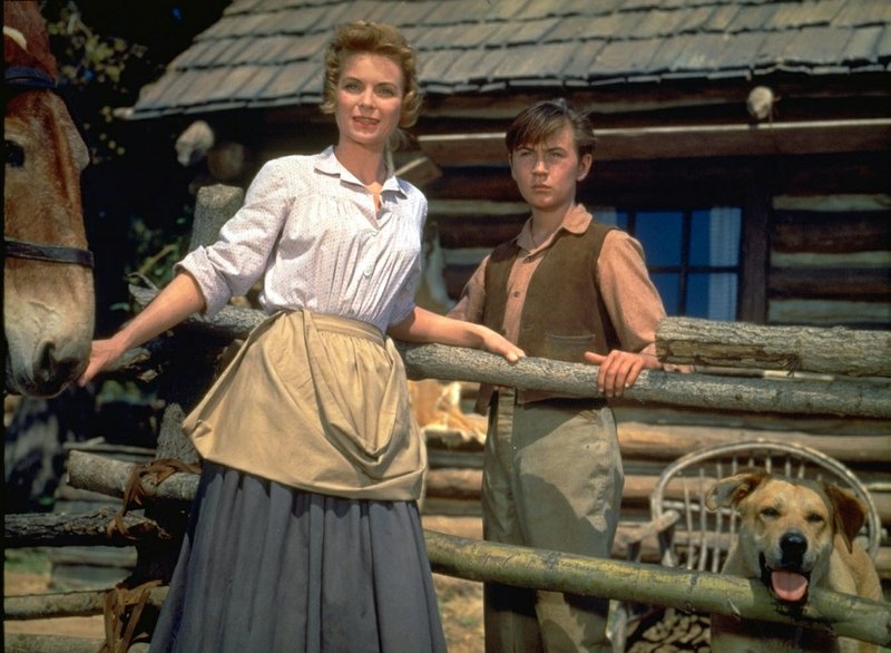 This image released by Disney shows Dorothy McGuire, left, and Tommy Kirk in a scene from the 1957 classic &#x201c;Old Yeller.&quot; The film is among 25 films to be added to the National Film Registry of the Library of Congress. (Disney via AP)